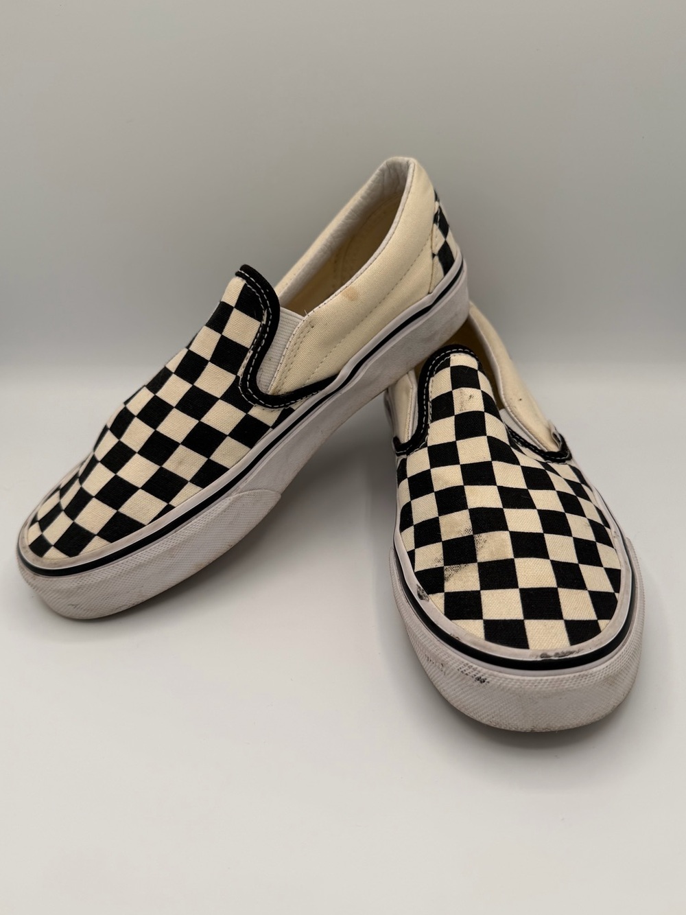 Vans Checkerboard Slip-On Sneakers in Black & White